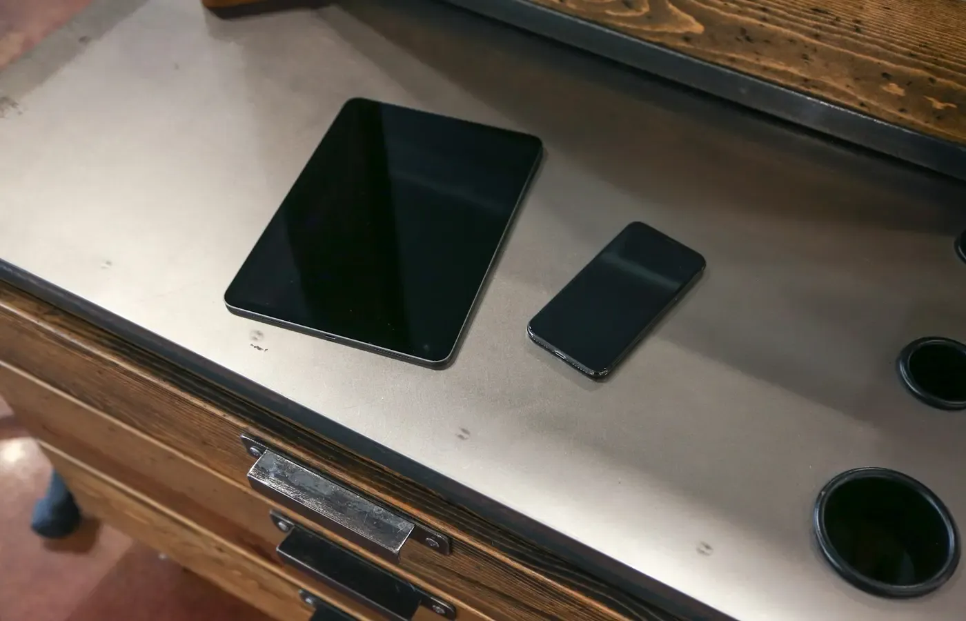 Refurbished smartphone on an inspection desk