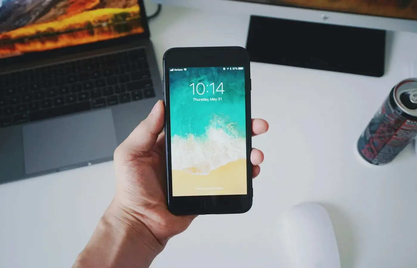 Smartphone beside an external backup drive