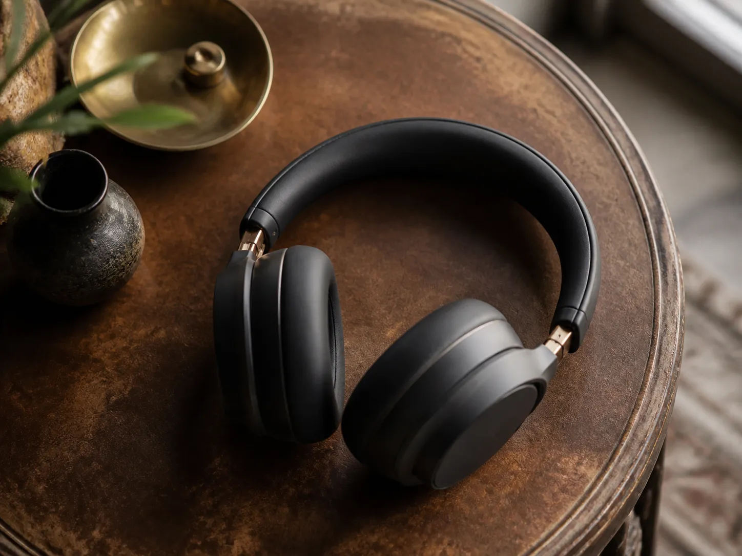 A listener enjoying music through headphones and a streaming service